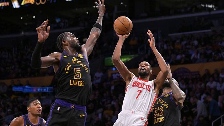 Apr 21, 2026; Los Angeles, California, USA; Houston Rockets forward Kevin Durant (7) is defended by Los Angeles Lakers center Deandre Ayton (5) as he drives to the basket during the second half of game two of the first round of the 2026 NBA Playoffs at Crypto.com Arena. Mandatory Credit: Jayne Kamin-Oncea-Imagn Images