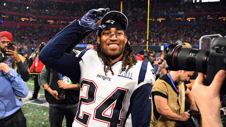 Feb 3, 2019; Atlanta, GA, USA; New England Patriots cornerback Stephon Gilmore (24) celebrates after winning Super Bowl LIII against the Los Angeles Rams at Mercedes-Benz Stadium. Mandatory Credit: Christopher Hanewinckel-Imagn Images
