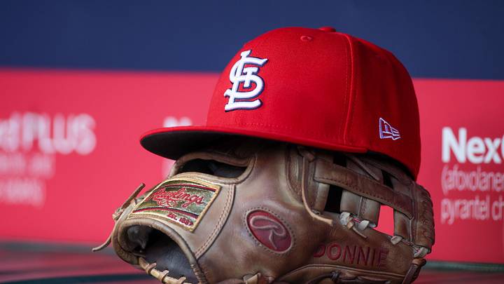 Apr 21, 2025; Atlanta, Georgia, USA; A St. Louis Cardinals hat and glove in the dugout against the Atlanta Braves in the first inning at Truist Park. Mandatory Credit: Brett Davis-Imagn Images Apr 21, 2025; Atlanta, Georgia, USA; A St. Louis Cardinals hat and glove in the dugout against the Atlanta Braves in the first inning at Truist Park. Mandatory Credit: Brett Davis-Imagn Images