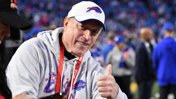 Former Buffalo Bills quarterback Jim Kelly on the field prior to the start of the game against the Baltimore Ravens. Former Buffalo Bills quarterback Jim Kelly on the field prior to the start of the game against the Baltimore Ravens.