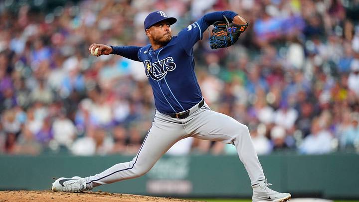 Aug 4, 2026; Denver, Colorado, USA; Tampa Bay Rays starting pitcher Freddy Peralta (51) delivers a pitch in the fourth inning against the Colorado Rockies at Coors Field. Mandatory Credit: Ron Chenoy-Imagn Images Aug 4, 2026; Denver, Colorado, USA; Tampa Bay Rays starting pitcher Freddy Peralta (51) delivers a pitch in the fourth inning against the Colorado Rockies at Coors Field. Mandatory Credit: Ron Chenoy-Imagn Images
