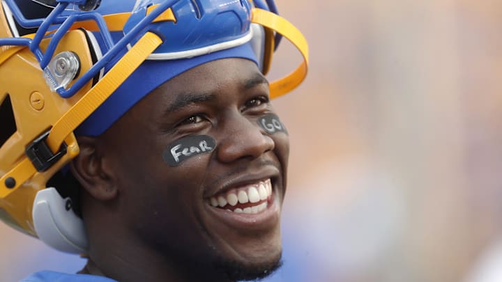 Sep 21, 2024; Pittsburgh, Pennsylvania, USA; Pittsburgh Panthers wide receiver Konata Mumpfield (9) smiles on the sidelines during the third quarter against the Youngstown State Penguins at Acrisure Stadium. Mandatory Credit: Charles LeClaire-Imagn Images Sep 21, 2024; Pittsburgh, Pennsylvania, USA; Pittsburgh Panthers wide receiver Konata Mumpfield (9) smiles on the sidelines during the third quarter against the Youngstown State Penguins at Acrisure Stadium. Mandatory Credit: Charles LeClaire-Imagn Images