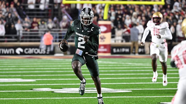 Sep 21, 2024; Chestnut Hill, Massachusetts, USA; Michigan State Spartans quarterback Aidan Chiles (2) runs the ball against the Boston College Eagles during the first half at Alumni Stadium. Mandatory Credit: Eric Canha-Imagn Images