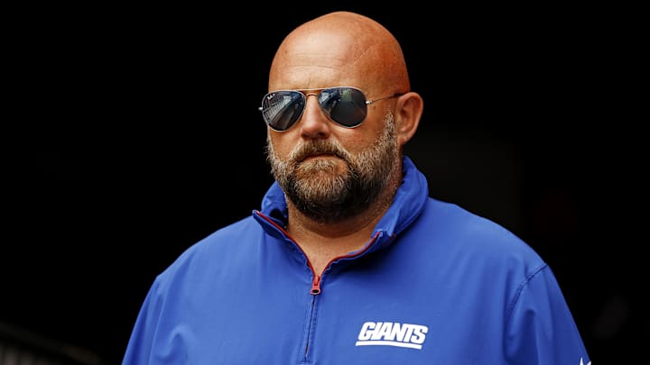 Sep 7, 2025; Landover, Maryland, USA; The New York Giants head coach Brian Daboll enters the field before the game against the Washington Commanders at Northwest Stadium. Mandatory Credit: Peter Casey-Imagn Images