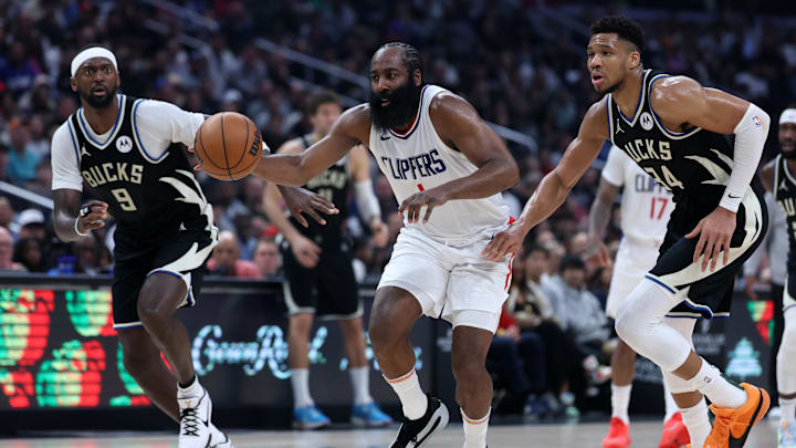 Mar 10, 2024; Los Angeles, California, USA; Los Angeles Clippers guard James Harden (1) dribbles the ball between Milwaukee Bucks forward Bobby Portis (9) and forward Giannis Antetokounmpo (34) during the second quarter at Crypto.com Arena. Mandatory Credit: Kiyoshi Mio-Imagn Images Mar 10, 2024; Los Angeles, California, USA; Los Angeles Clippers guard James Harden (1) dribbles the ball between Milwaukee Bucks forward Bobby Portis (9) and forward Giannis Antetokounmpo (34) during the second quarter at Crypto.com Arena. Mandatory Credit: Kiyoshi Mio-Imagn Images