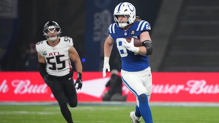 Nov 9, 2025; Berlin, Germany; Indianapolis Colts tight end Tyler Warren (84) runs after a catch against the Atlanta Falcons during the NFL Berlin Game at Olympic Stadium. Mandatory Credit: Kirby Lee-Imagn Images