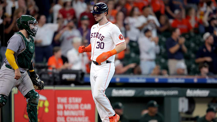 Sep 12, 2024; Houston, Texas, USA; Houston Astros designated hitter Kyle Tucker (30) crosses home plate to score a run against the Oakland Athletics during the eighth inning at Minute Maid Park.