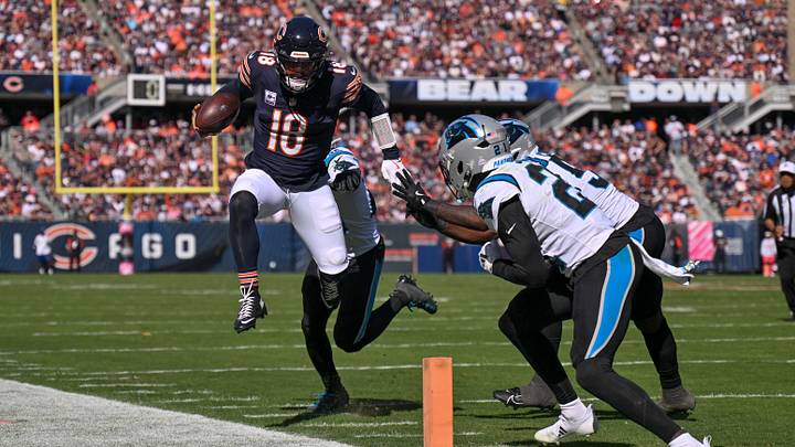 Oct 6, 2024; Chicago, Illinois, USA; Chicago Bears quarterback Caleb Williams (18) runs the ball against the Carolina Panthers during the third quarter at Soldier Field. Mandatory Credit: Daniel Bartel-Imagn Images Oct 6, 2024; Chicago, Illinois, USA; Chicago Bears quarterback Caleb Williams (18) runs the ball against the Carolina Panthers during the third quarter at Soldier Field. Mandatory Credit: Daniel Bartel-Imagn Images