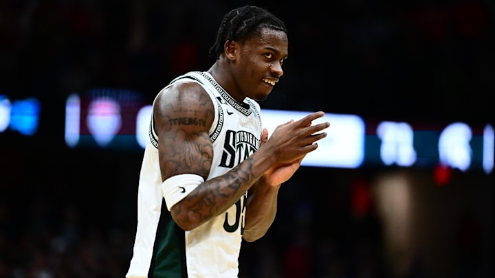 Mar 23, 2025; Cleveland, OH, USA; Michigan State Spartans forward Coen Carr (55) reacts after defeating the New Mexico Lobos during the NCAA Tournament Second Round at Rocket Arena. Mandatory Credit: Ken Blaze-Imagn Images