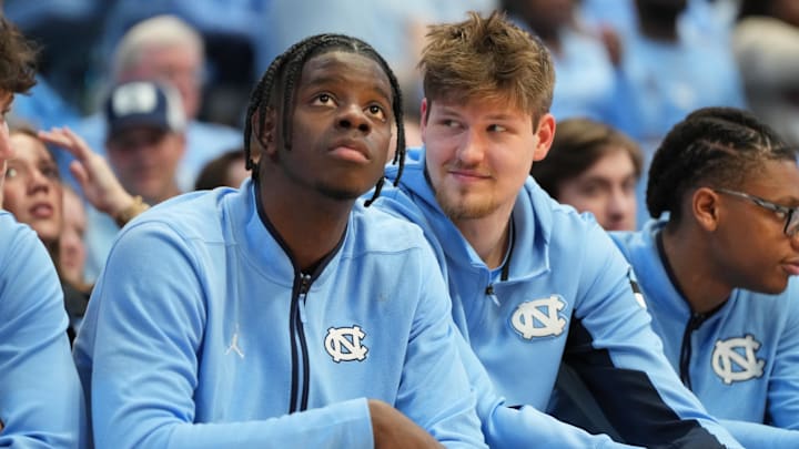 North Carolina Tar Heels forward Caleb Wilson (8) and center Henri Veesaar (13)