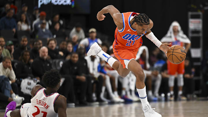 Nov 2, 2024; Inglewood, California, USA; Oklahoma City Thunder guard Aaron Wiggins (21) drives the ball against LA Clippers guard Kobe Brown (21) during the second half at Intuit Dome. Mandatory Credit: Jonathan Hui-Imagn Images Nov 2, 2024; Inglewood, California, USA; Oklahoma City Thunder guard Aaron Wiggins (21) drives the ball against LA Clippers guard Kobe Brown (21) during the second half at Intuit Dome. Mandatory Credit: Jonathan Hui-Imagn Images