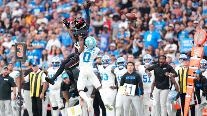 Sep 22, 2024; Glendale, Arizona, USA; Detroit Lions cornerback Terrion Arnold (0) defends a pass to Arizona Cardinals wide receiver Marvin Harrison Jr. (18) during the second half at State Farm Stadium. Mandatory Credit: Joe Camporeale-Imagn Images Sep 22, 2024; Glendale, Arizona, USA; Detroit Lions cornerback Terrion Arnold (0) defends a pass to Arizona Cardinals wide receiver Marvin Harrison Jr. (18) during the second half at State Farm Stadium. Mandatory Credit: Joe Camporeale-Imagn Images
