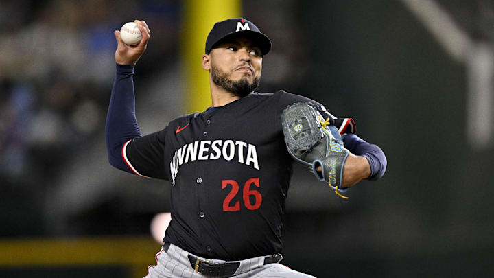 Sep 24, 2025; Arlington, Texas, USA; Minnesota Twins starting pitcher Taj Bradley (26) throws the ball during the third inning against the Texas Rangers at Globe Life Field.