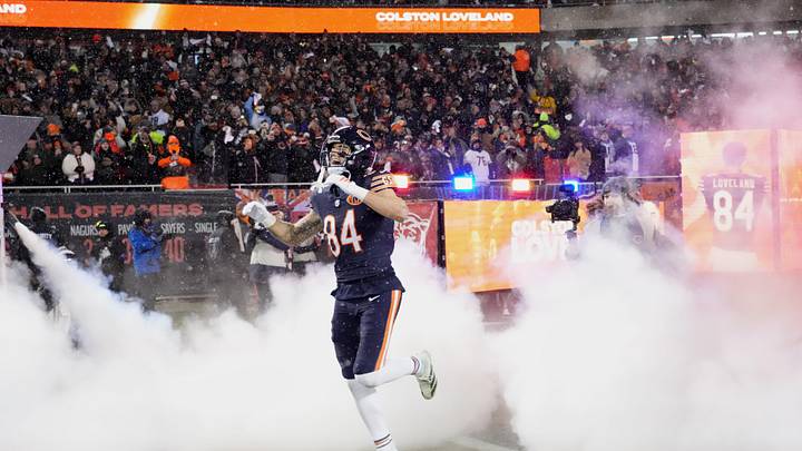 Jan 18, 2026; Chicago, IL, USA; Chicago Bears tight end Colston Loveland (84) runs nto the field during player introductions before an NFC Divisional game against the Los Angeles Rams at Soldier Field. Mandatory Credit: David Banks-Imagn Images