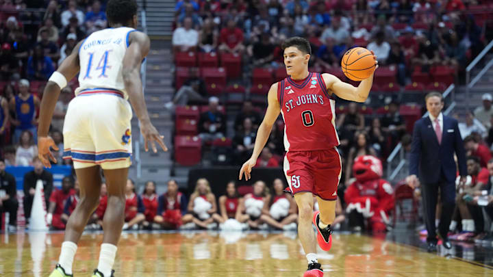 Mar 22, 2026; San Diego, CA, USA; St. John's Red Storm guard Dylan Darling (0) controls the ball against the Kansas Jayhawks in the first half during a second round game of the men's 2026 NCAA Tournament at Viejas Arena. Mandatory Credit: Kirby Lee-Imagn Images
