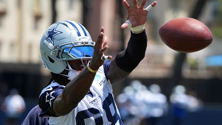 Dallas Cowboys receiver CeeDee Lamb catches the ball at training camp at the River Ridge Fields. Dallas Cowboys receiver CeeDee Lamb catches the ball at training camp at the River Ridge Fields.