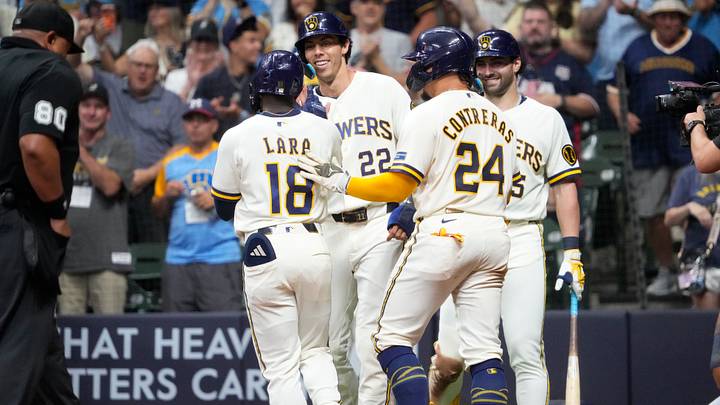Aug 18, 2026; Milwaukee, Wisconsin, USA; Milwaukee Brewers right fielder Luis Lara (18) is congratulated by designated hitter Christian Yelich (22) after hitting a home run against the Seattle Mariners in the eighth inning at American Family Field. Mandatory Credit: Michael McLoone-Imagn Images Aug 18, 2026; Milwaukee, Wisconsin, USA; Milwaukee Brewers right fielder Luis Lara (18) is congratulated by designated hitter Christian Yelich (22) after hitting a home run against the Seattle Mariners in the eighth inning at American Family Field. Mandatory Credit: Michael McLoone-Imagn Images