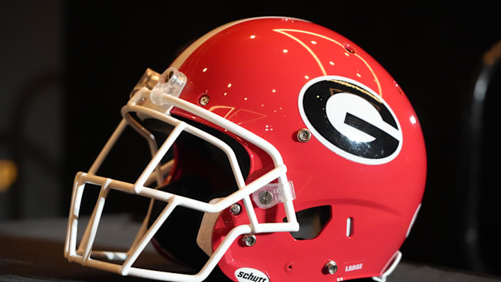 Jan 8, 2023; Los Angeles, CA, USA; A Georgia Bulldogs helmet at the 2023 CFP National Championship head coaches press conference at the Los Angeles Airport Marriott. Mandatory Credit: Kirby Lee-Imagn Images Jan 8, 2023; Los Angeles, CA, USA; A Georgia Bulldogs helmet at the 2023 CFP National Championship head coaches press conference at the Los Angeles Airport Marriott. Mandatory Credit: Kirby Lee-Imagn Images