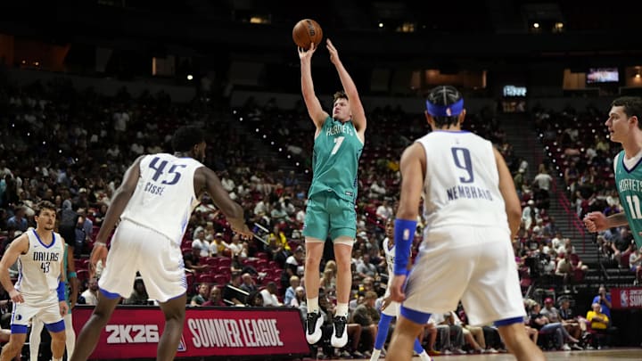 Jul 14, 2025; Las Vegas, NV, USA; Charlotte Hornets guard Kon Knueppel (7) shoots the ball against the Dallas Mavericks during the second half of a NBA basketball game at the Thomas & Mack Center.