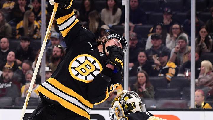 Oct 10, 2026; Boston, Massachusetts, USA;  Boston Bruins defenseman Nikita Zadorov (91) gets high sticked in the face during the second period against the Philadelphia Flyers at TD Garden. Mandatory Credit: Bob DeChiara-Imagn Images