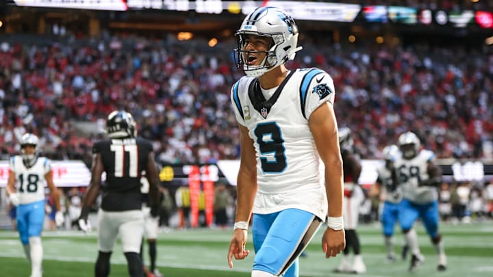 Nov 16, 2025; Atlanta, Georgia, USA; Carolina Panthers quarterback Bryce Young (9) reacts to a touchdown in the fourth quarter against the Atlanta Falcons at Mercedes-Benz Stadium. 