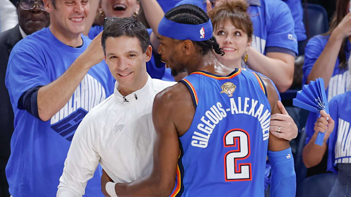 Jun 22, 2025; Oklahoma City, Oklahoma, USA; Oklahoma City Thunder guard Shai Gilgeous-Alexander (2) hugs head coach Mark Daigneault in the final seconds of their game against the Indiana Pacers during game seven of the 2025 NBA Finals at Paycom Center. Mandatory Credit: Alonzo Adams-Imagn Images Jun 22, 2025; Oklahoma City, Oklahoma, USA; Oklahoma City Thunder guard Shai Gilgeous-Alexander (2) hugs head coach Mark Daigneault in the final seconds of their game against the Indiana Pacers during game seven of the 2025 NBA Finals at Paycom Center. Mandatory Credit: Alonzo Adams-Imagn Images