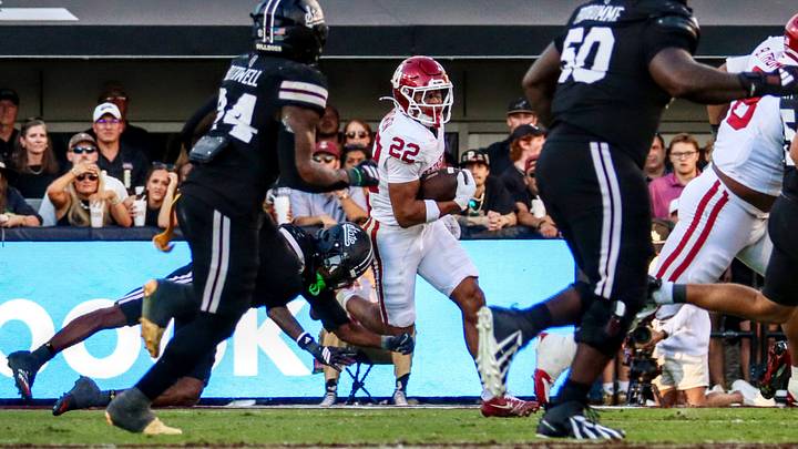 Oklahoma defensive back Peyton Bowen tries to return an interception against Mississippi State.