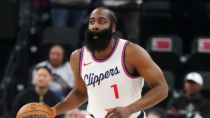 Mar 9, 2025; Inglewood, California, USA; LA Clippers guard James Harden (1) dribbles the ball against the Sacramento Kings in the first half at Intuit Dome. Mandatory Credit: Kirby Lee-Imagn Images