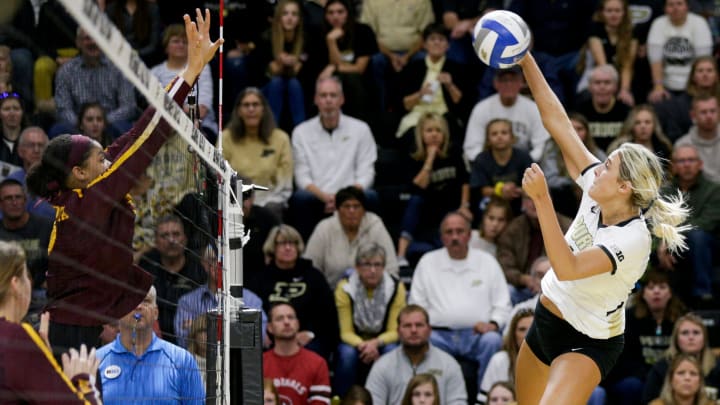Purdue middle blocker Blake Mohler (17) spikes the ball Purdue middle blocker Blake Mohler (17) spikes the ball