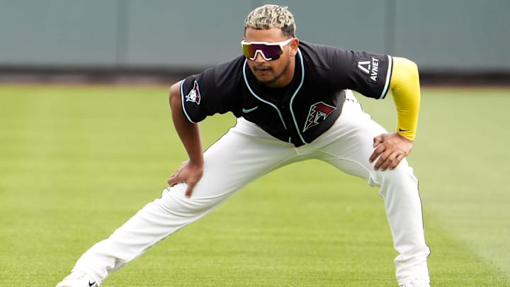 Arizona Diamondbacks Gabriel Moreno stretches before playing the Chicago Cubs during a spring training game at Salt River Fields on March 3, 2025.