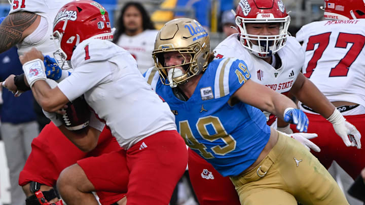UCLA Bruins linebacker Carson Schwesinger sacks Fresno State Bulldogs quarterback Mikey Keene.