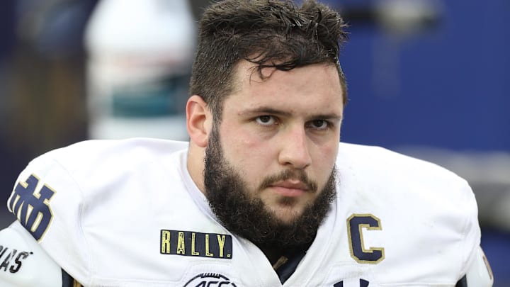 Oct 24, 2020; Pittsburgh, Pennsylvania, USA;  Notre Dame Fighting Irish offensive lineman Robert Hainsey (72) looks on from the sidelines against the Pittsburgh Panthers during the second quarter at Heinz Field. Notre Dame won 45-3. Mandatory Credit: Charles LeClaire-Imagn Images