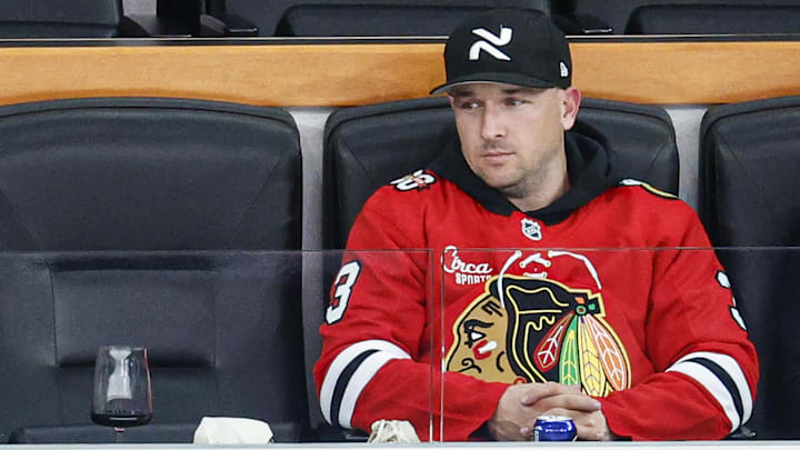 Jan 12, 2026; Chicago, Illinois, USA; Chicago Cubs third baseman Alex Bregman watches an NHL game between the Chicago Blackhawks and Edmonton Oilers during the third period at United Center. Mandatory Credit: Kamil Krzaczynski-Imagn Images