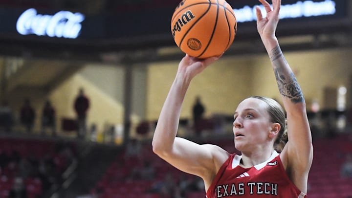 Texas Tech's Denae Fritz shoots against TCU