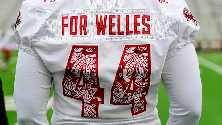 Sep 16, 2023; Chestnut Hill, Massachusetts, USA; A Boston College Eagles player wears a \"For Welles\" warm-up jersey honoring Welles Crowther before a game against the Florida State Seminoles at Alumni Stadium. Mandatory Credit: Eric Canha-Imagn Images