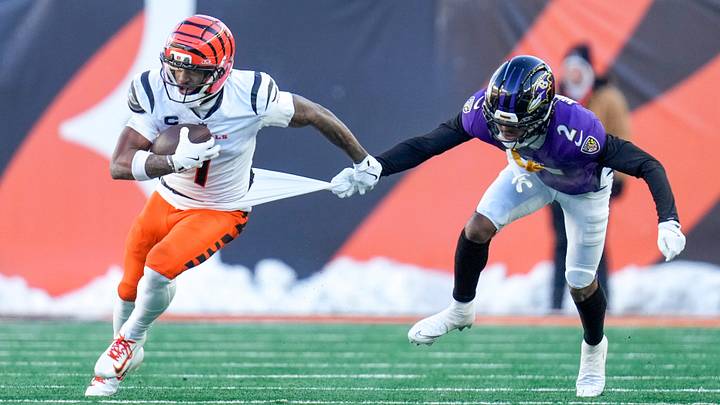 Cincinnati Bengals wide receiver Ja'Marr Chase (1) is pulled on by Baltimore Ravens cornerback Nate Wiggins (2) after a catch in the fourth quarter of the NFL Week 15 game between the Cincinnati Bengals and the Baltimore Ravens at Paycor Stadium in Cincinnati on Sunday, Dec. 14, 2025. The Bengals were shut out, 24-0. Cincinnati Bengals wide receiver Ja'Marr Chase (1) is pulled on by Baltimore Ravens cornerback Nate Wiggins (2) after a catch in the fourth quarter of the NFL Week 15 game between the Cincinnati Bengals and the Baltimore Ravens at Paycor Stadium in Cincinnati on Sunday, Dec. 14, 2025. The Bengals were shut out, 24-0.