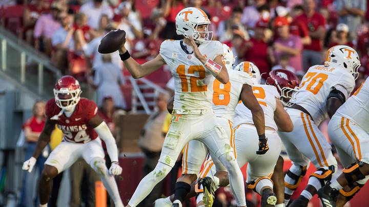 Oct 10, 2026; Fayetteville, Arkansas, USA;  Tennessee Volunteers quarterback George MacIntyre (12) looks to throw during the third quarter against the Arkansas Razorbacks at Donald W. Reynolds Razorback Stadium.  Mandatory Credit: Brett Rojo-Imagn Images
