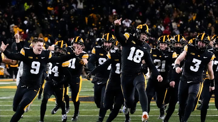 Iowa Hawkeyes place kicker Drew Stevens (18) celebrates after kicking the game-winning field goal against the Nebraska Cornhuskers to win 13-10 Friday, Nov. 29, 2024 at Kinnick Stadium in Iowa City, Iowa.