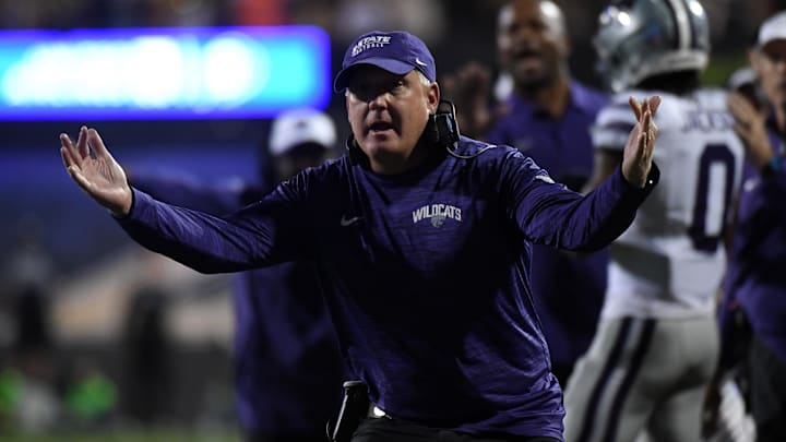 Oct 12, 2024; Boulder, Colorado, USA; Kansas State Wildcats head coach Chris Klieman celebrates after a touchdown during the first half against the Colorado Buffaloes at Folsom Field. Mandatory Credit: Christopher Hanewinckel-Imagn Images
