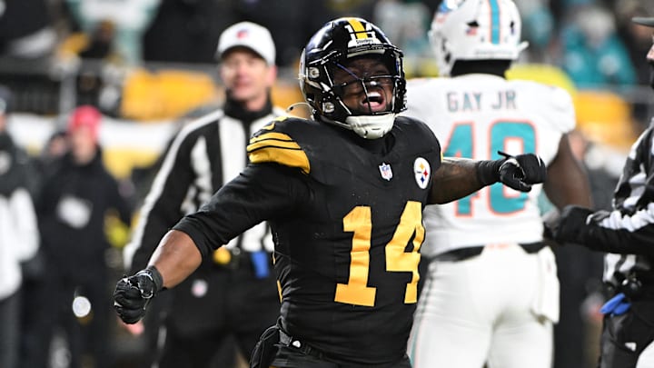 Dec 15, 2025; Pittsburgh, Pennsylvania, USA; Pittsburgh Steelers running back Kenneth Gainwell (14) celebrates a touchdown scored by tight end Connor Heyward (83) in the second quarter against the Miami Dolphins at Acrisure Stadium.