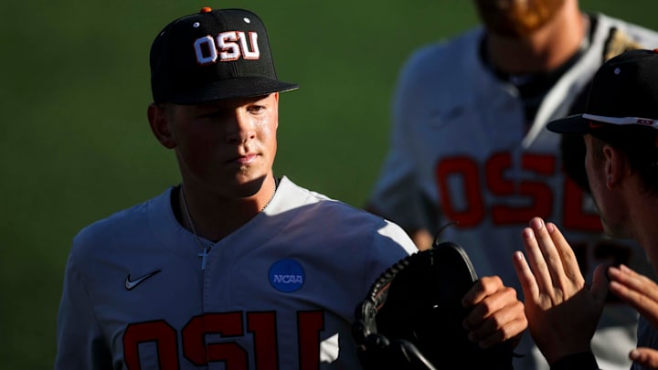 Oregon State pitcher Ethan Kleinschmit (24) walks into the dugout after striking out Florida State in game 2 of the NCAA Super Regional at Goss Stadium on Saturday, June 7, 2025 in Corvallis.