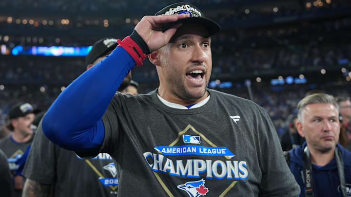 Toronto Blue Jays designated hitter George Springer (4) celebrates after winning game seven of the ALCS round for the 2025 MLB playoffs against the Seattle Mariners at Rogers Centre. Toronto Blue Jays designated hitter George Springer (4) celebrates after winning game seven of the ALCS round for the 2025 MLB playoffs against the Seattle Mariners at Rogers Centre.
