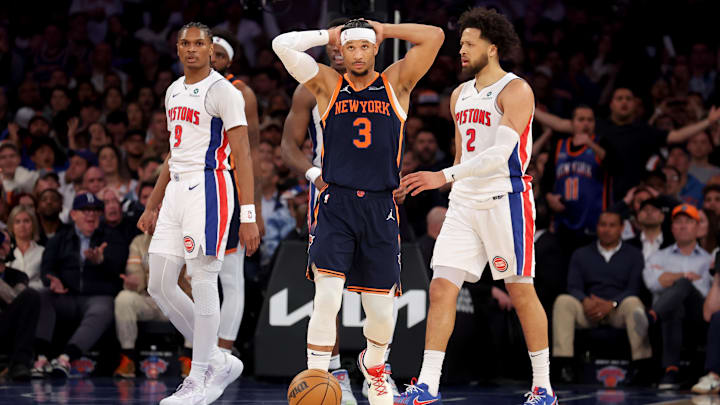 Apr 21, 2025; New York, New York, USA; New York Knicks guard Josh Hart (3) reacts in front of Detroit Pistons forward Ausar Thompson (9) and guard Cade Cunningham (2) : Brad Penner-Imagn Images