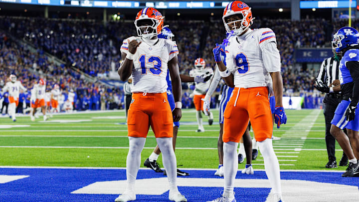 Nov 8, 2025; Lexington, Kentucky, USA; Florida Gators running back Jadan Baugh (13) celebrates with wide receiver J. Michael Sturdivant (9) after scoring a touchdown during the first quarter against the Kentucky Wildcats at Kroger Field. Mandatory Credit: Jordan Prather-Imagn Images Nov 8, 2025; Lexington, Kentucky, USA; Florida Gators running back Jadan Baugh (13) celebrates with wide receiver J. Michael Sturdivant (9) after scoring a touchdown during the first quarter against the Kentucky Wildcats at Kroger Field. Mandatory Credit: Jordan Prather-Imagn Images