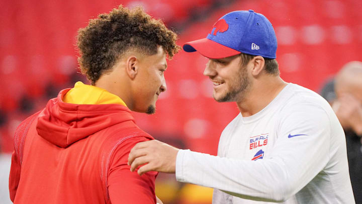 Oct 10, 2021; Kansas City, Missouri, USA; Kansas City Chiefs quarterback Patrick Mahomes (15) talks with Buffalo Bills quarterback Josh Allen (17) before warm ups at GEHA Field at Arrowhead Stadium. Mandatory Credit: Denny Medley-Imagn Images