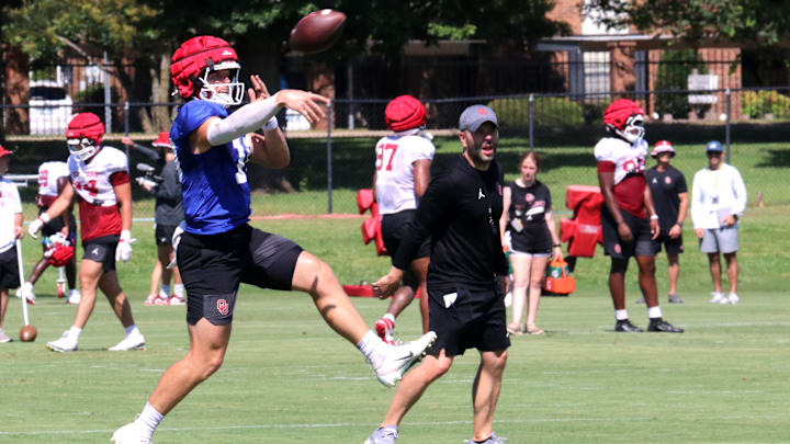 Oklahoma quarterback John Mateer throws during practice. Oklahoma quarterback John Mateer throws during practice.