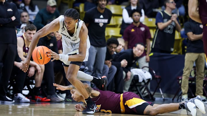 Nov 26, 2023; Boulder, Colorado, USA; Colorado Buffaloes forward Cody Williams (10) controls the