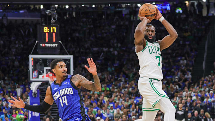 Apr 25, 2025; Orlando, Florida, USA: Boston Celtics guard Jaylen Brown (7) passes the ball around Orlando Magic guard Gary Harris (14) during the second half of game three of first round for the 2024 NBA Playoffs at Kia Center. Mandatory Credit: Mike Watters-Imagn Images Apr 25, 2025; Orlando, Florida, USA: Boston Celtics guard Jaylen Brown (7) passes the ball around Orlando Magic guard Gary Harris (14) during the second half of game three of first round for the 2024 NBA Playoffs at Kia Center. Mandatory Credit: Mike Watters-Imagn Images