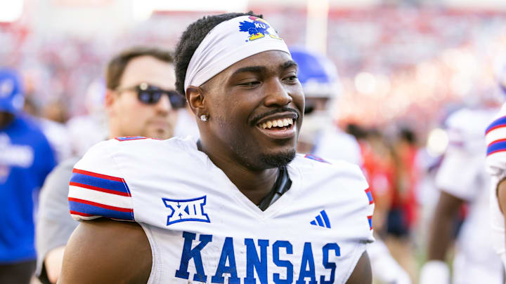 Nov 8, 2025; Tucson, Arizona, USA; Kansas Jayhawks quarterback Jalon Daniels (6) against the Arizona Wildcats at Arizona Stadium. Mandatory Credit: Mark J. Rebilas-Imagn Images