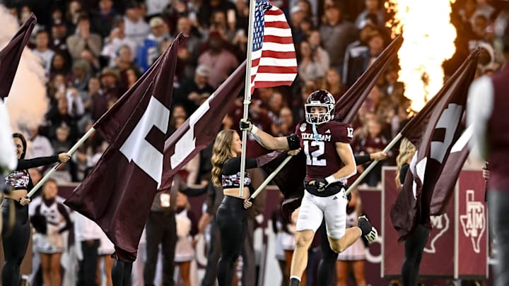 Nov 11, 2023; College Station, Texas, USA; Texas A&M Aggies linebacker Sam Mathews (12) runs out